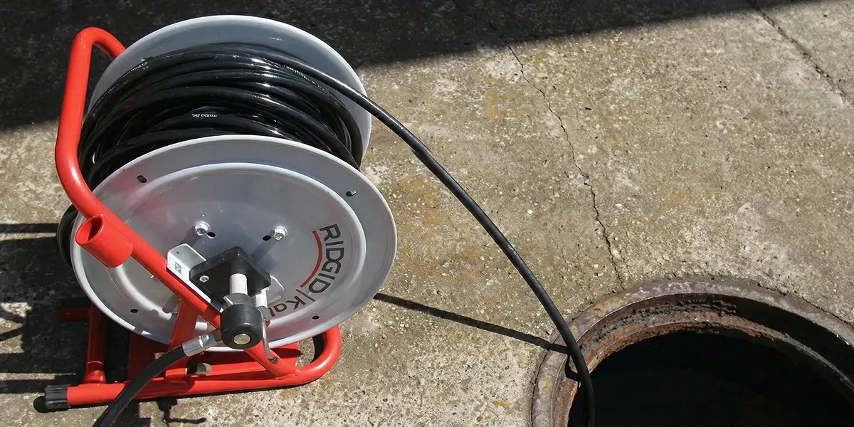 sewer rodding equipment prepared to clear clogged sewer lines in Baton Rouge, LA